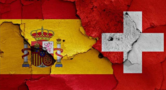 Complemento por mínimos Complemento por mínimos. Bandera española con un simbolo más dentro