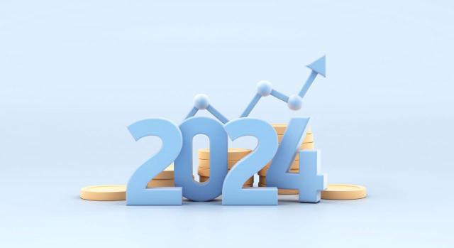 Publicado el real decreto en el que se recoge la revalorización de pensiones para el año 2024. Imagen del número del año 2024 sobre unas mones y una flecha en alza